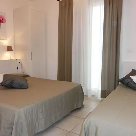 Апартаменти Comfy With Shared Pool