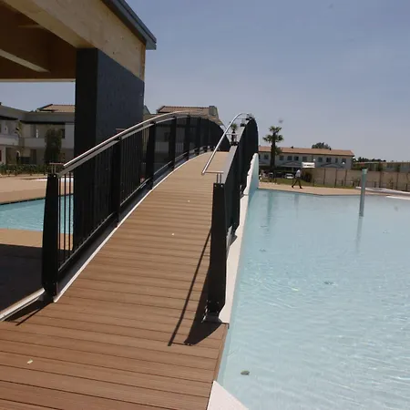Апартаменты Comfy With Shared Pool