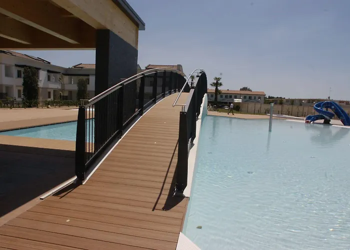 Апартаменты Comfy With Shared Pool